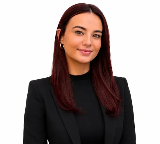 Girl in a dark shirt and blazer, light background