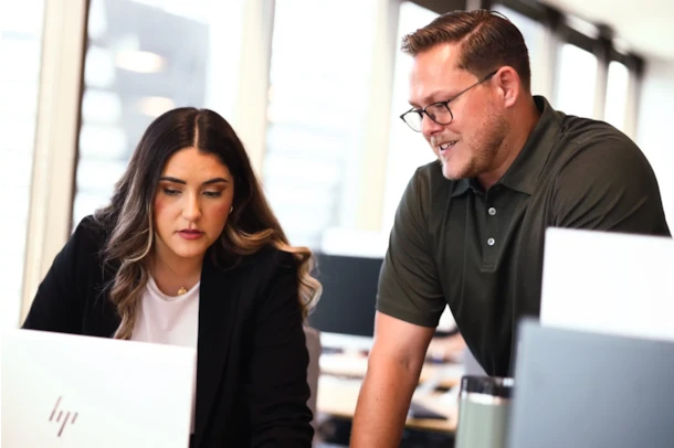 Employees collaborating in modern office