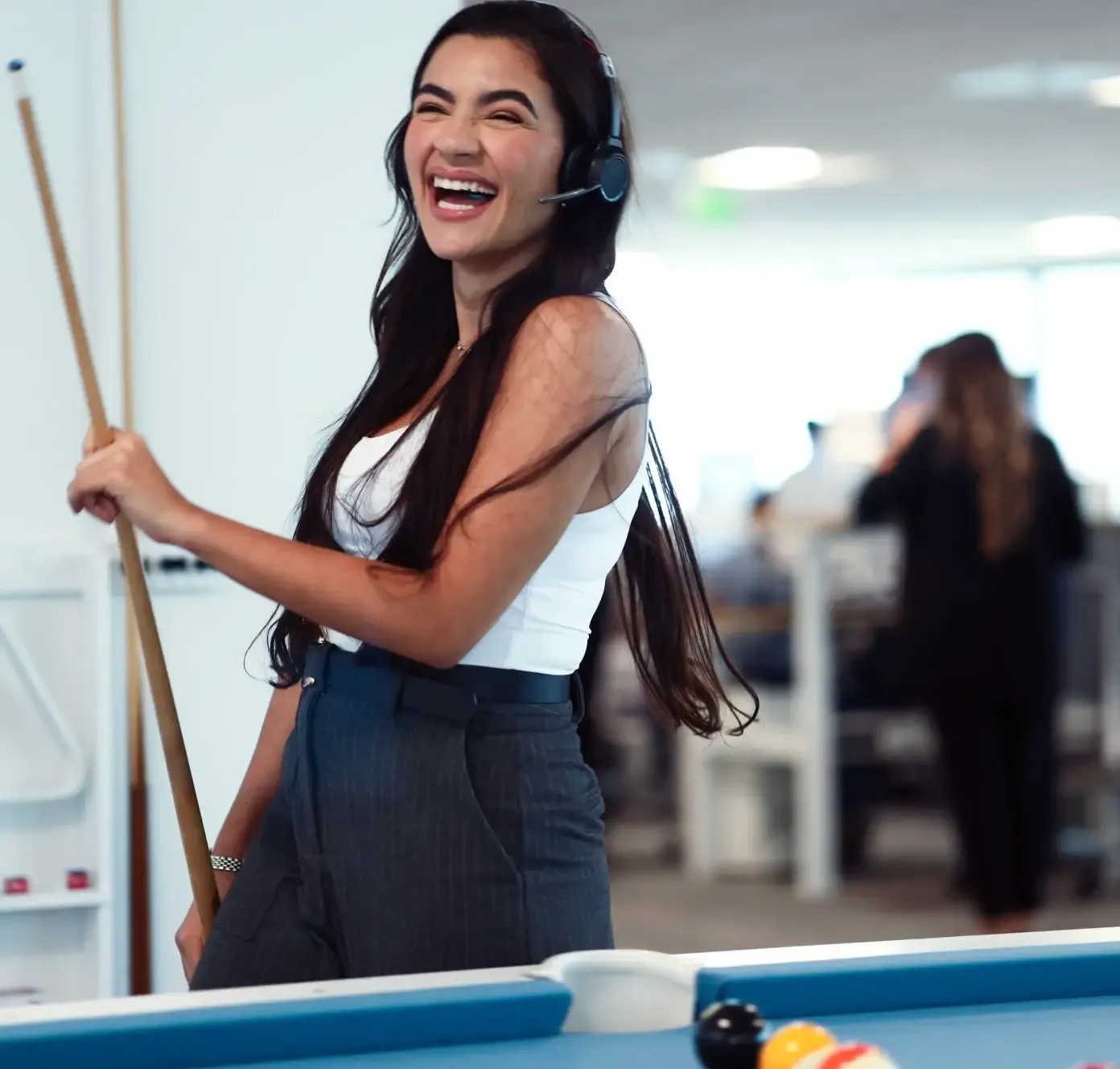 Discover team member competing in billiards