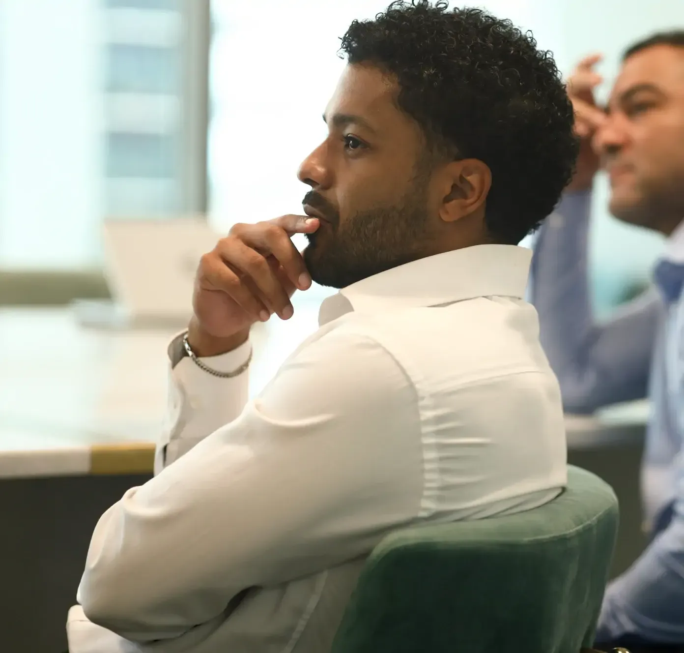 Team members collaborating in office