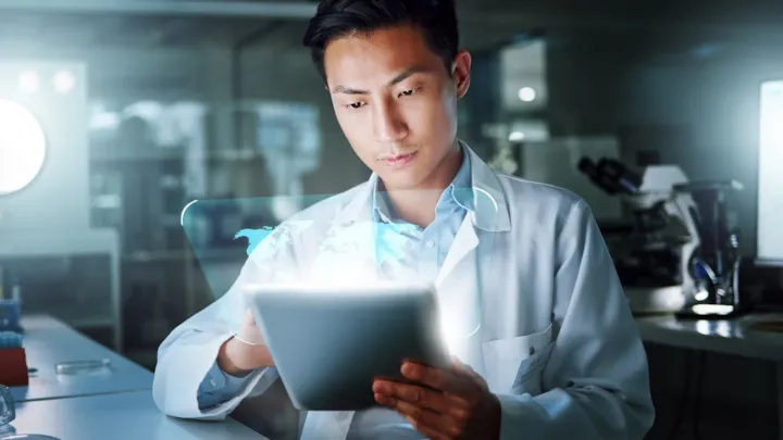 scientist working on tablet