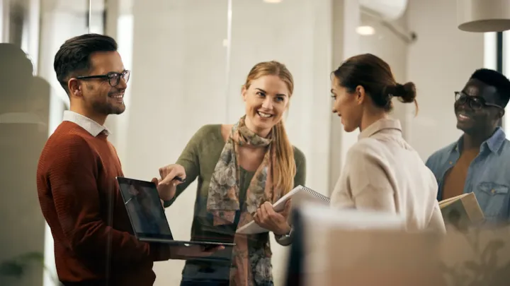 business team smiling and talking